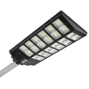 Close-up view of a rectangular LED street light attached to a pole, featuring multiple LED panels and a visible control module.